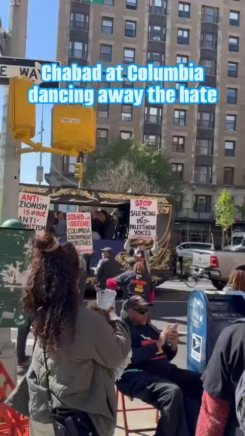Rabbi Yuda and Naomi Drizin, who direct Chabad at Columbia University, brought a party bus to campus today, with blasting Jewish music and spirited chassidic dancing in a show of Jewish pride in the face of hatred.