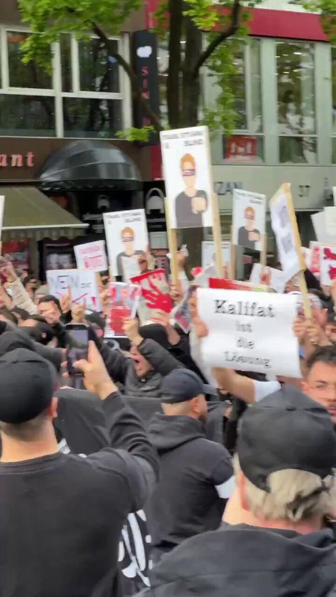 Sreams of Allahu Akbar Echo Throughout Germany! Hordes of Muslims March Through Hamburg, Demanding a Caliphate in Germany and Media to Abide by Sharia Mobilizing the Umma (the global Muslim community) to establish their Islamic Civilization is their admitted goal. Today in Hamburg, over a thousand Muslims gathered, led by Joe Adade Boateng, also known as “Raheem Boateng,” from the radical group Muslim Interaktiv. This group has ties to the banned Islamic organization Hizb ut-Tahrir and advocates for an Islamic caliphate, demanding a media that adheres to sharia law, thus challenging the fundamental right of freedom of the press. See full story:
