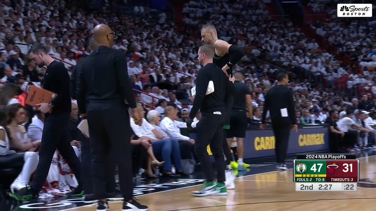 Kristaps Porzingis heads to the locker room after suffering a non-contact injury