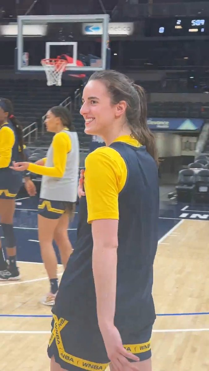 Caitlin Clark wins the first halfcourt shot contest of the season...but Kelsey Mitchell says she needs to back up 😂 "She needs to start all the way back there because her regular shot starts right here!"