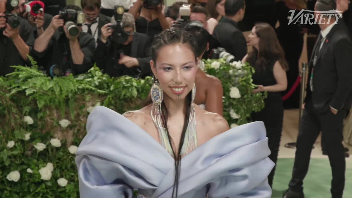 Quannah Chasinghorse poses for photos at the #MetGala.