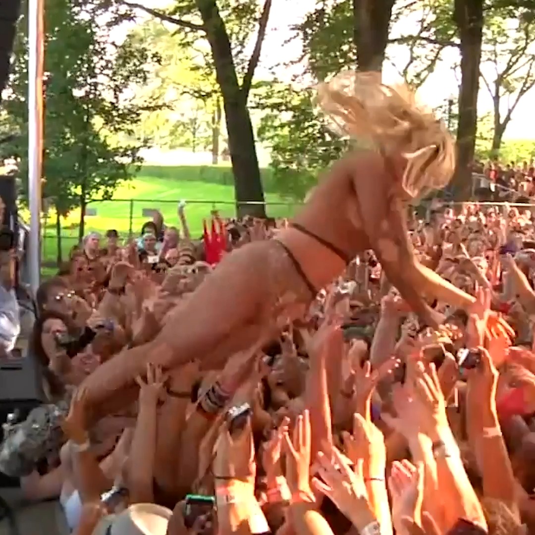 Aug 6, 2010: Lady Gaga drops by the BMI stage to stage dive with Semi Precious Weapons.