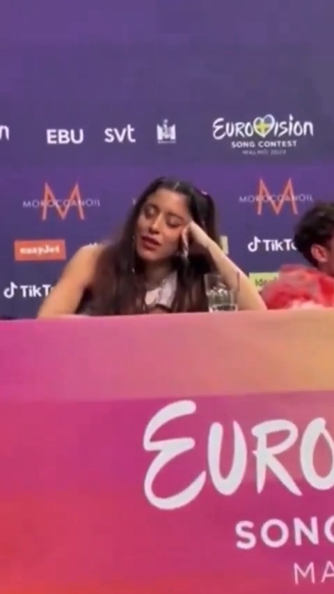 #MarinaSatti #Greece’s caused controversy when she kept yawning and pretending to fall asleep as Eden Golan, the representative of #Israel was speaking to the press. Full story: