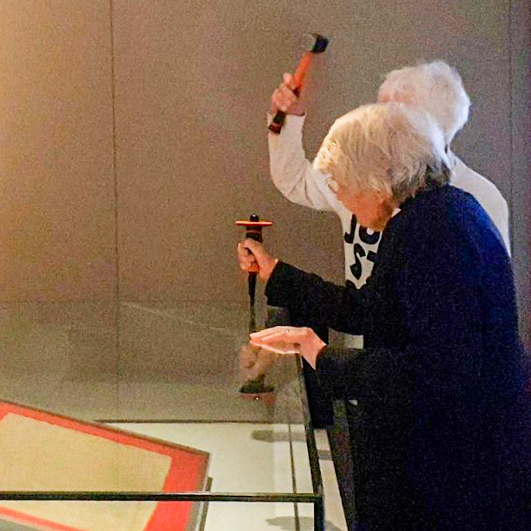 Two climate protesters in their 80s tried to smash the case that holds the Magna Carta at the British Library in London. The pair held up a sign that read "The government is breaking the law" before gluing themselves to the display.