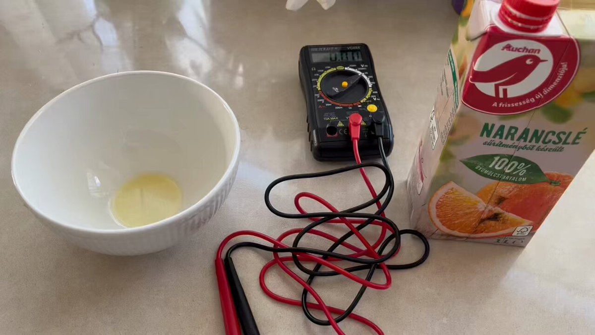I’m planning a long article about the baghdad battery. But first things first: let me see it working! I don’t care “expert opinion”, facts are facts. So I set up this “baghdad battery” in a rush, as a proof of concept, and TÁDÁMMM! it works. Even this rudimentary setup can produce 0.44 Volts. Copper + iron + orange 🍊 juice. (Which is not really surprising if someone knows the physics behind… it should have 0.78 Volts instead khm.) This is just one battery cell. You can connect them serially to have higher voltage or parallel to reach higher current. This is it for today. I have a lot of 🗿s to cast instead of this stupid battery 🔋