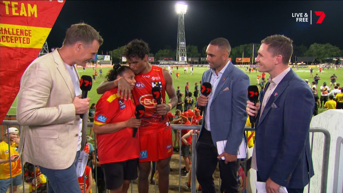A beautiful moment as Lloyd Johnston and his mum join us for a chat ๐ฅน Hear his incredible story, from running water for the Suns players to becoming part of the playing group ๐ #AFLSunsCats