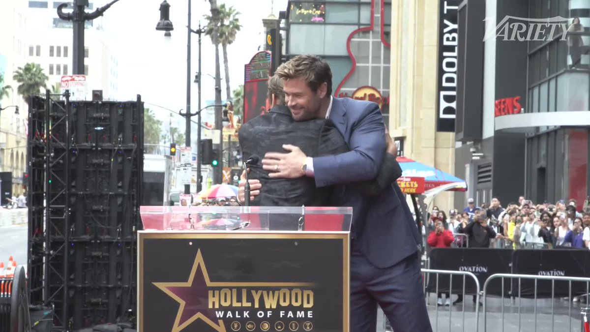 Robert Downey Jr. roasts Chris Hemsworth at the "Thor" star's Hollywood Walk of Fame ceremony, using phrases the "Avengers" cast sent to him.