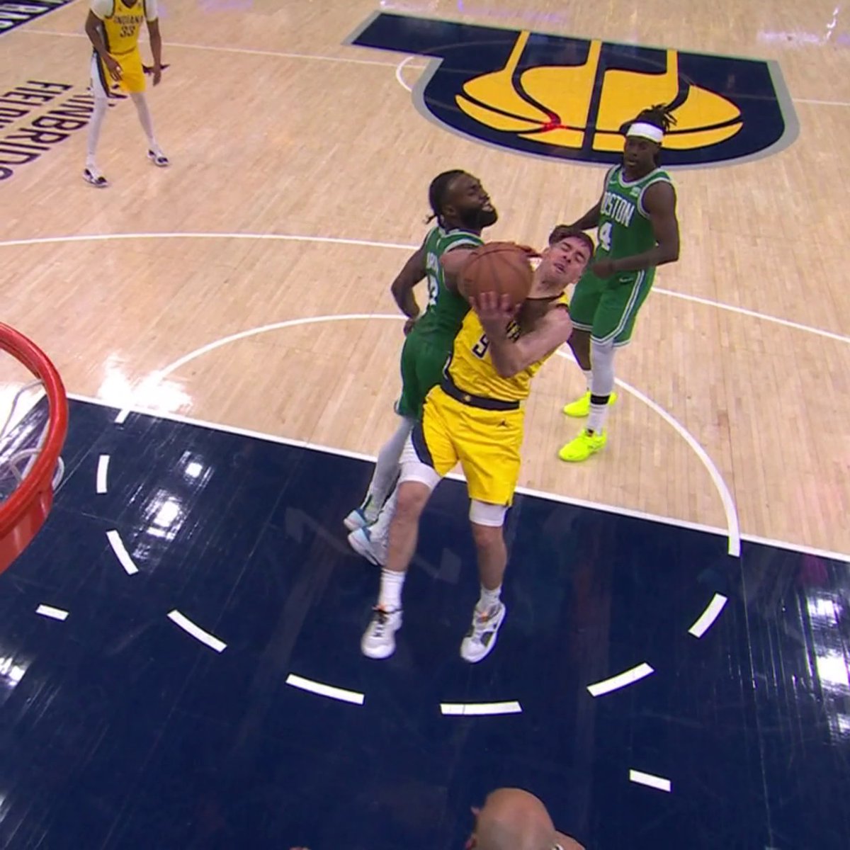 Jaylen Brown was called for a common foul on this play on T.J. McConnell.