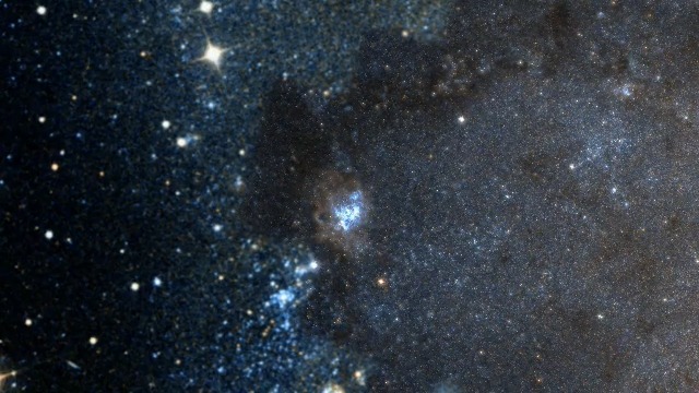 Zoom in to a glowing nebula and stars like sand grains in the Triangulum galaxy (M33), a testament to the power of Hubble. Triangulum is a cosmic neighbor to our Milky Way galaxy, located 2.7 million light-years away. Credit: NASA, ESA, STScI.