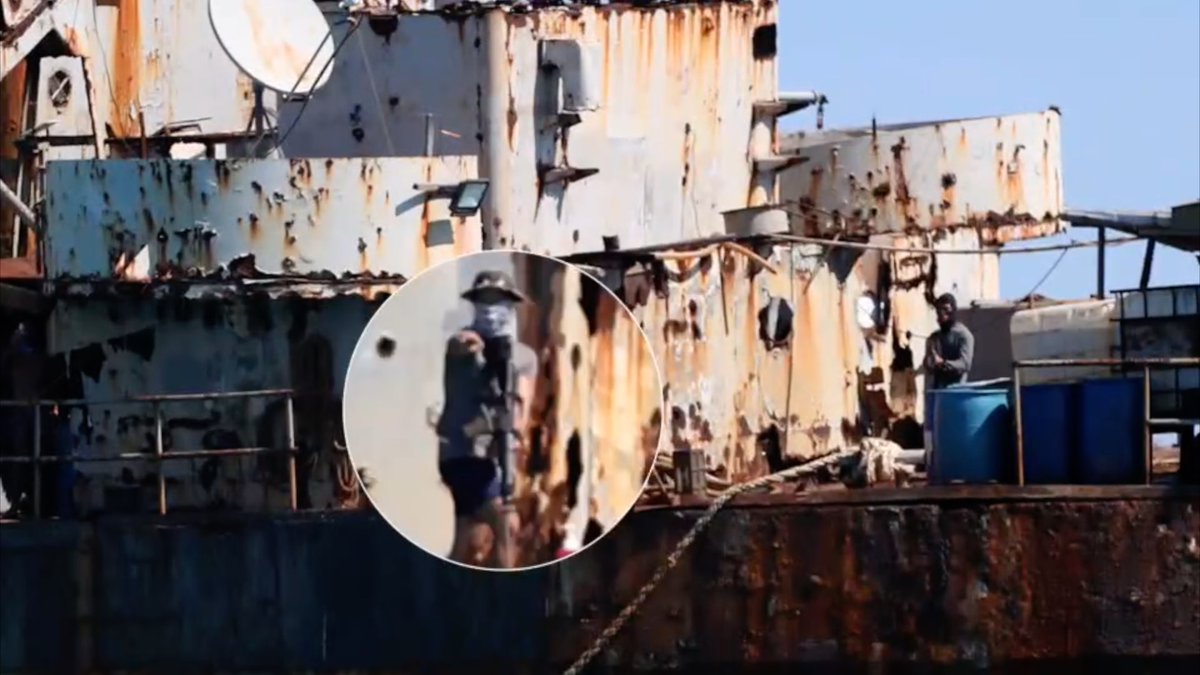 Footage shows Philippine personnel pointing guns at China Coast Guard officers