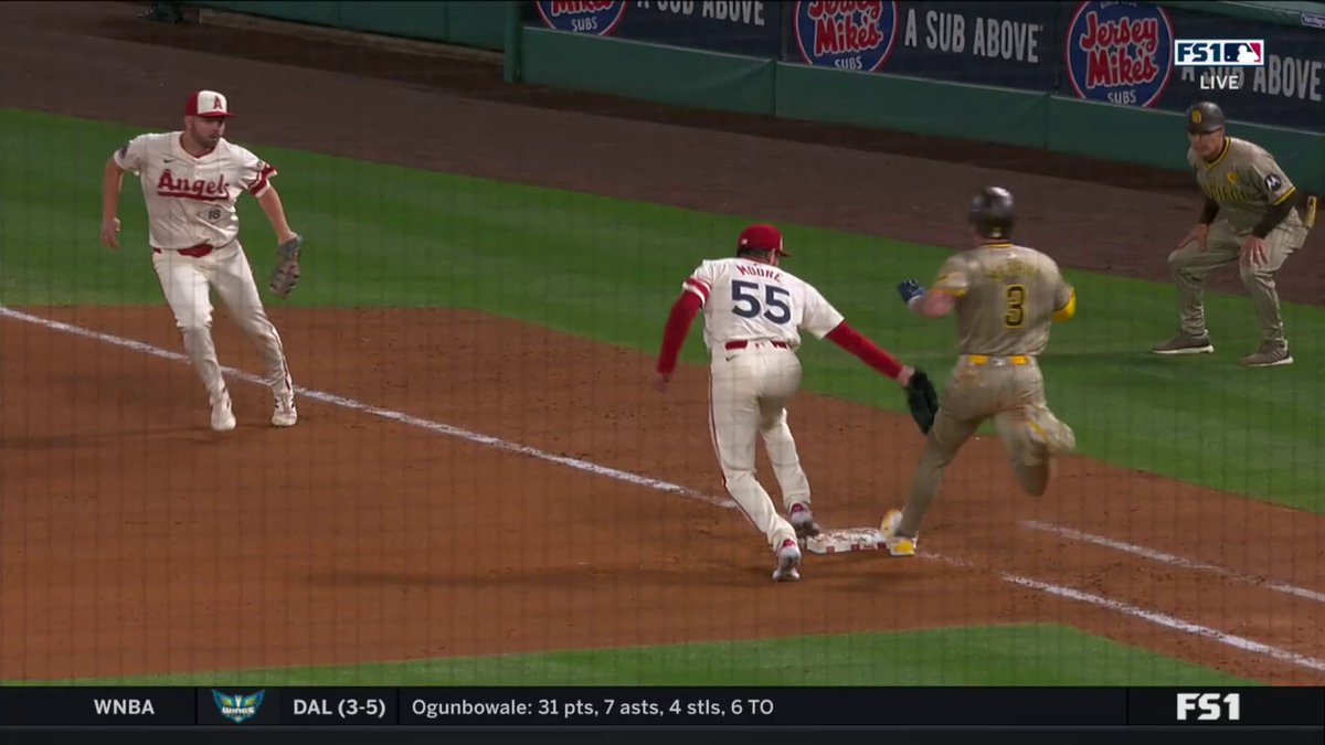 After originally being ruled safe, the umpires met and said Jackson Merrill was out. Do you agree with the call?