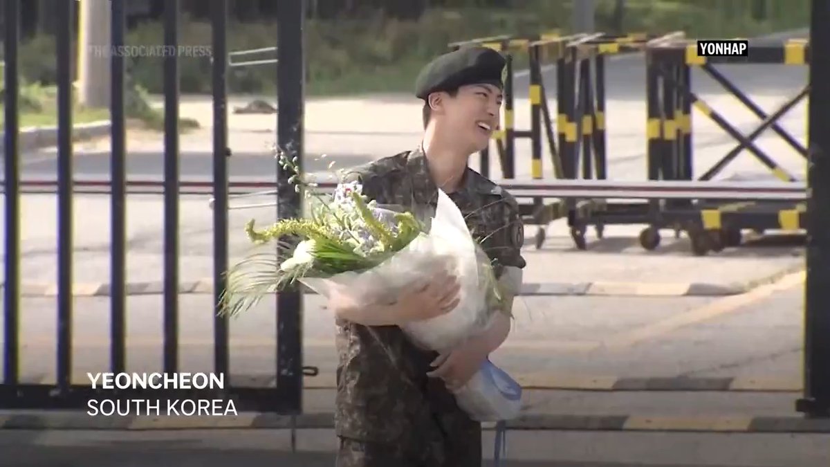 BTS member Jin was greeted by his fellow band members as he was discharged from his mandatory service in the South Korean military on Wednesday.