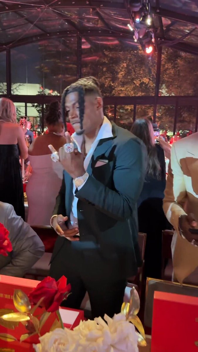 RASHEE RICE IS ENJOYING HIMSELF AT TONIGHT SB RING EVENT