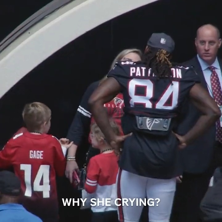 WHOLESOME: Cordarrelle Patterson making sure this little girl got a ball just like her brother.