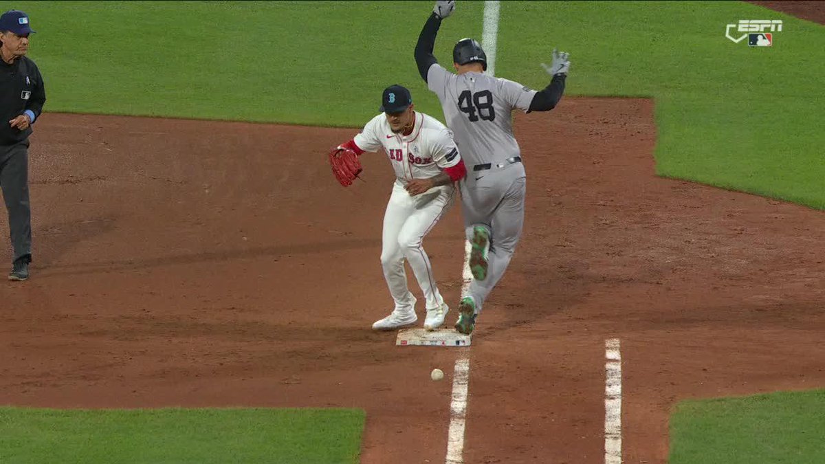 Anthony Rizzo left the game after this collision at first base.