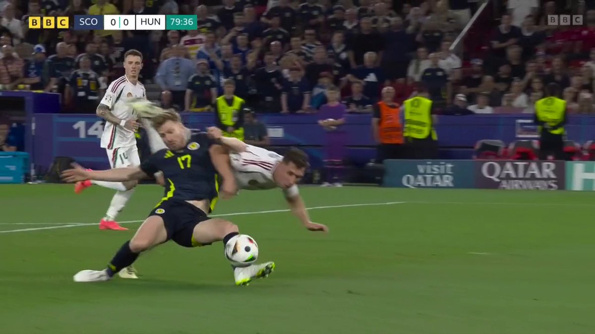 I’ve watched this about 20 times now and still don’t think it’s ‘stone wall’. Why does Stuart Armstrong stop all his momentum by leaping into the air rather than running onto the pass and getting a shot away?!