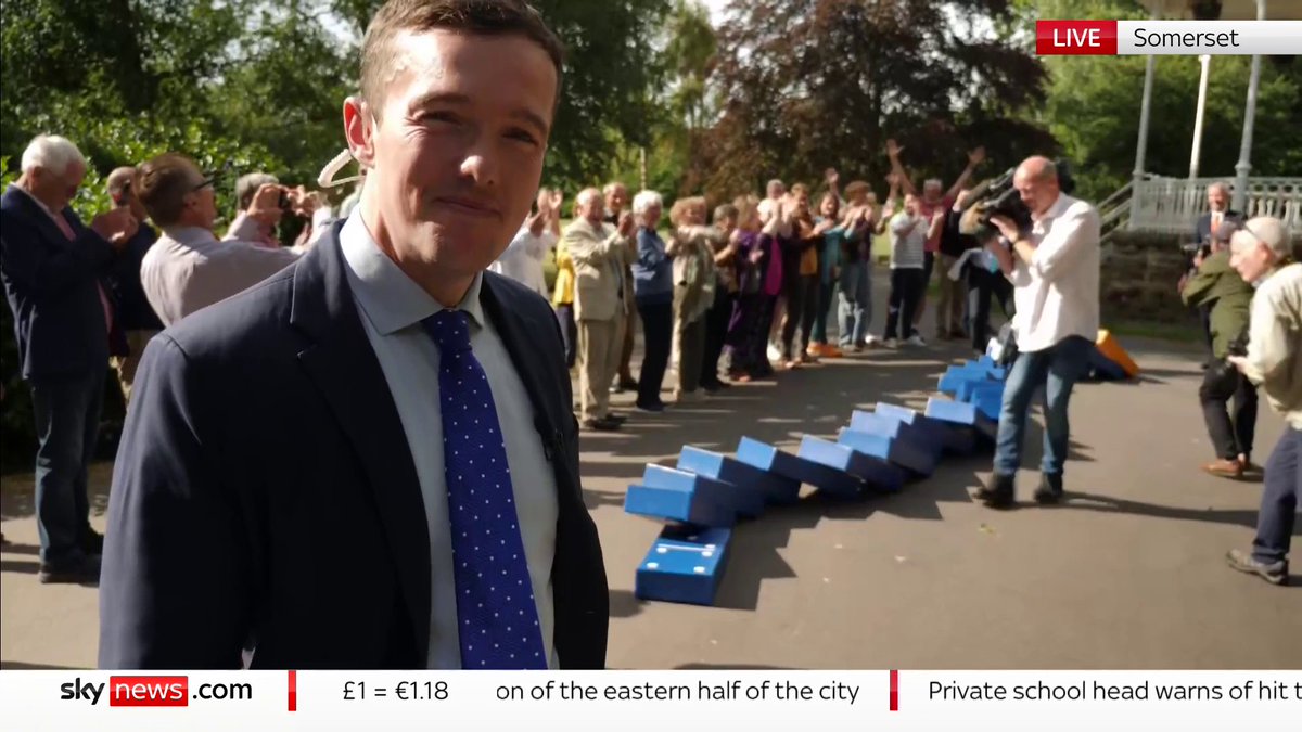 'There's a line of blue dominos and Ed Davey is walking along with a giant yellow domino in his hand... It doesn't take a genius to work out what the metaphor is here' Sky's Matthew Thompson has the latest from the Lib Dems' latest stunt ⬇️