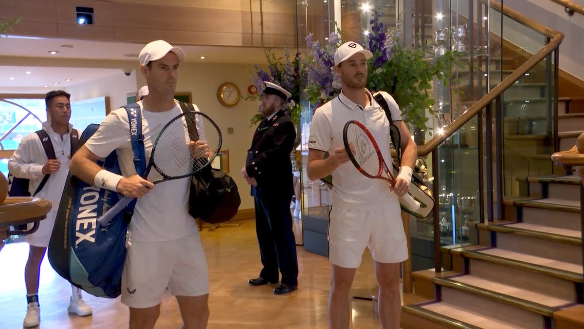 Centre Court rises for a legend ✨ In his final year at #Wimbledon, Andy Murray arrives on court with brother Jamie to start their doubles campaign