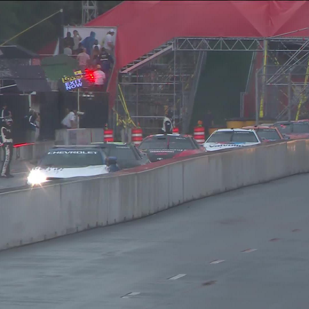 Cars have been brought to pit road due to rain at NASCAR Chicago Street Race. The red flag is out on Lap 26.