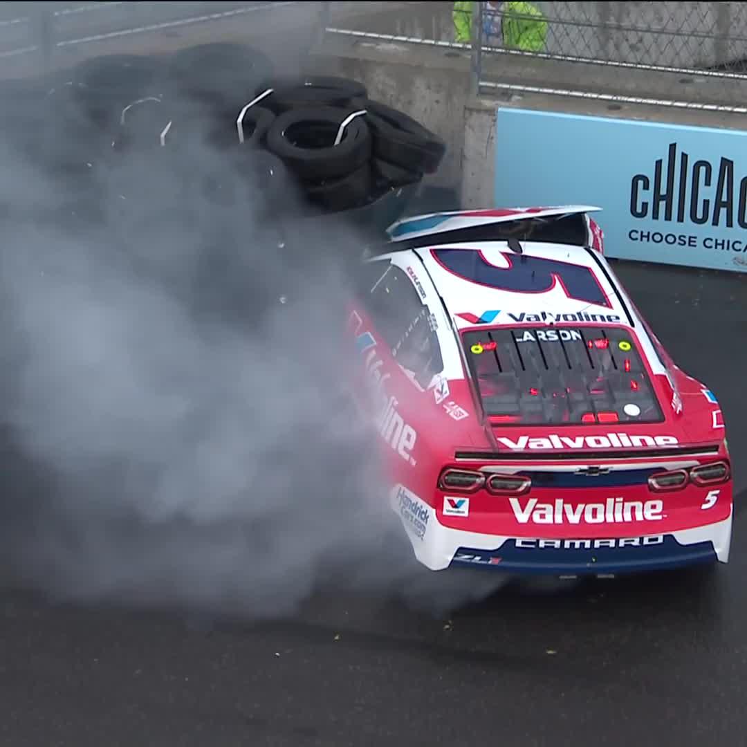 Now Larson gets into the tire barrier! #NASCARChicago