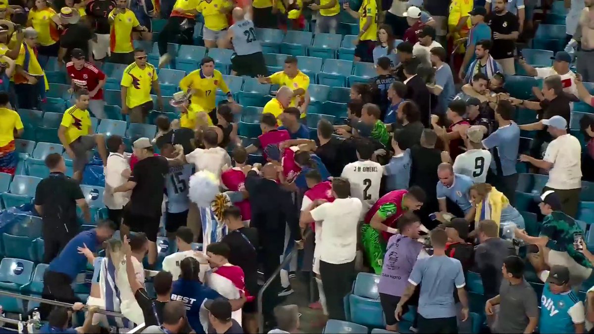 Uruguay players have entered the stands and a fight has broken out between fans and players