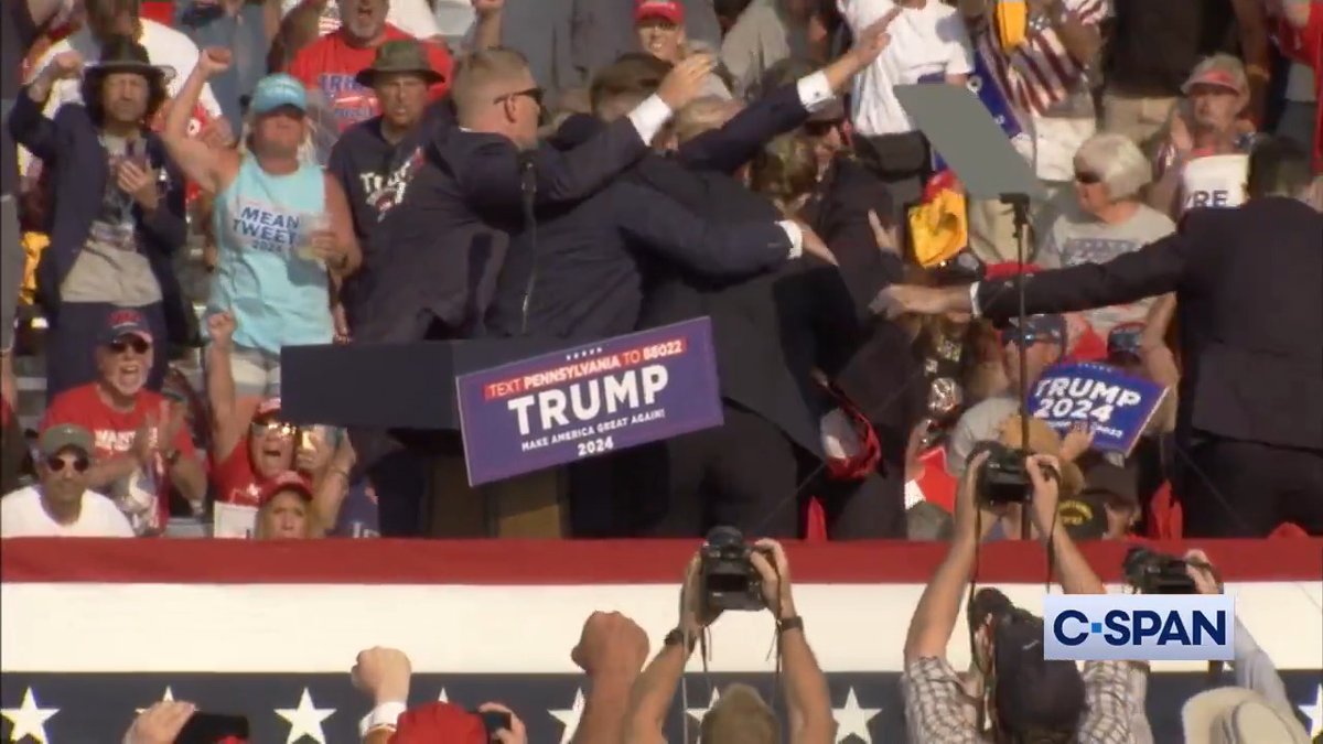 Possible gunshots at former President Trump's rally in Butler, PA. Secret Service escort Trump off the stage.
