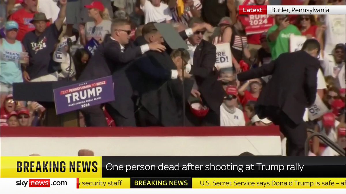 Two people have died after gunshots were fired at a Donald Trump rally in Pennsylvania - with the injured former president rushed off stage by armed security.