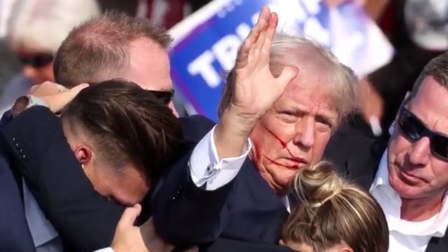 Donald Trump was shot in the right ear during a campaign rally in Butler, Pennsylvania, sparking panic and streaking the Republican presidential candidate's blood across his face