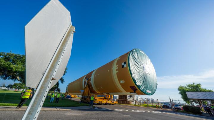 One step closer to flight! Teams have successfully rolled out the core stage of the ARCHIVED: NASA_SLS rocket for the #Artemis II mission. The core stage will travel 900 miles from NASA's Michoud Assembly Facility to NASA's Kennedy Space Center, where it will prepare for its next destination: the Moon!