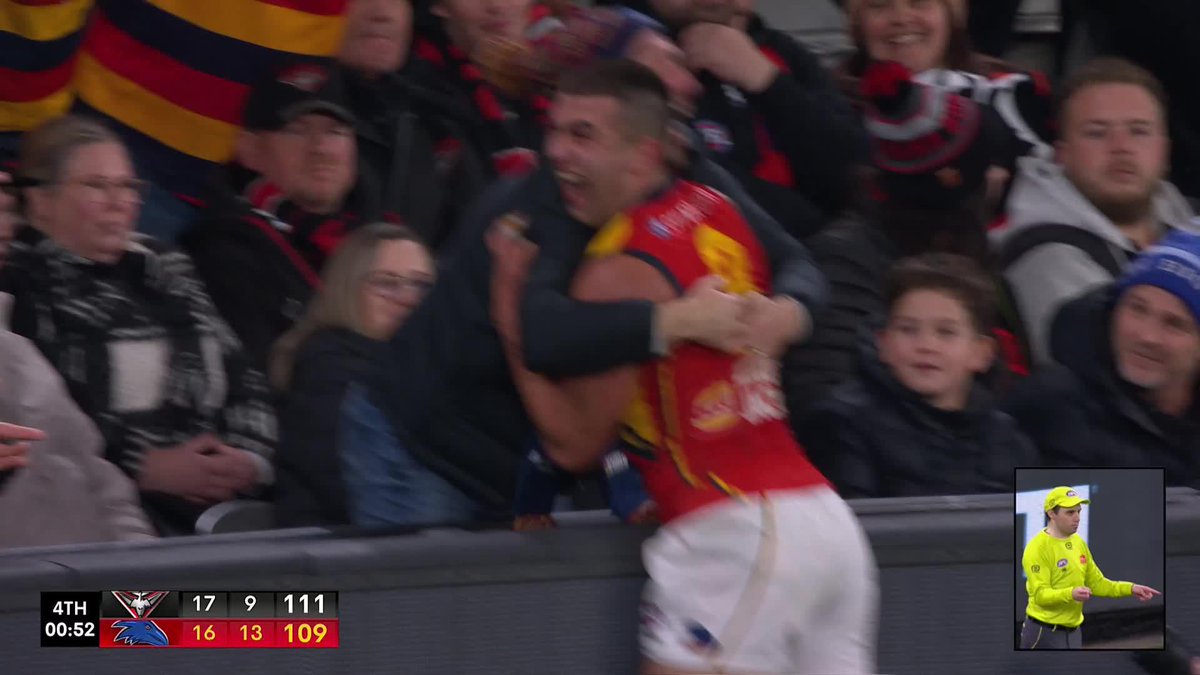 JOSH RACHELE HUGS A FAN IN THE CROWD WITH AN AMAZING MATCH WINNER! #AFLDonsCrows