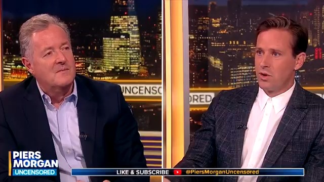 Armie Hammer denies cutting a past lover but admits he used the point of a knife to 'scrape' his initial onto her.