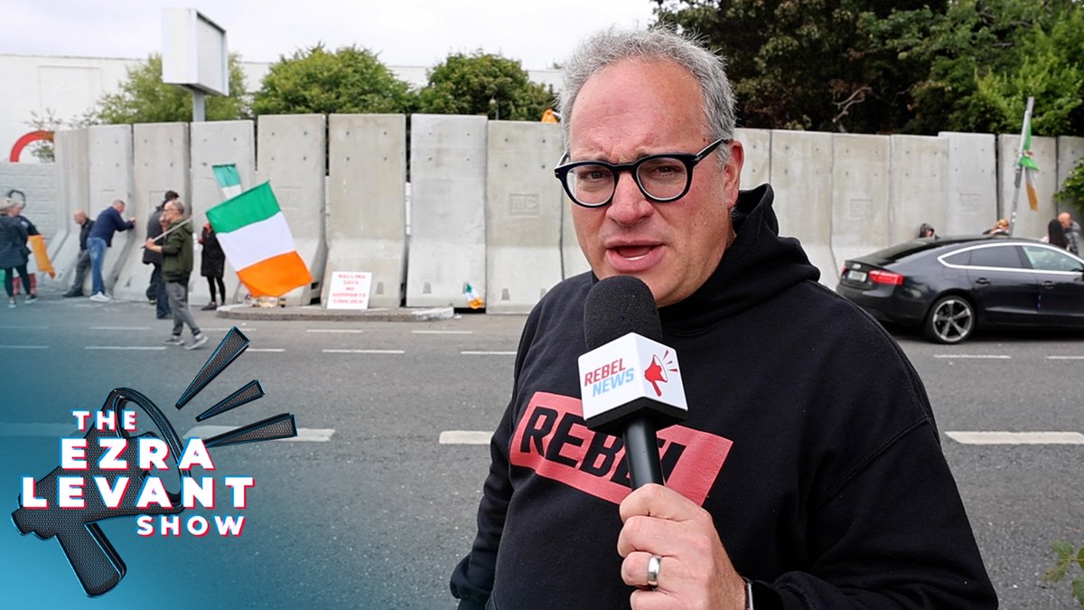 Irish citizens revolt against migrant housing scheme Rebel News CEO Ezra Levant 🍁🚛 has been on the ground in Coolock as protesters continue to demonstrate against the proposed migrant initiative. For months, locals have curtailed construction after erecting a makeshift blockade in front an abandoned warehouse. Men rotate there with signs. Who exactly are these men and what are they protesting? For months, the men of the Dublin neighbourhood of Coolock have vehemently opposed a government plan to convert the warehouse into housing for migrants. The initiative, which received no public consultations, would have some 500 migrant men housed near the bustling residential community. This is not a wealthy part of Dublin. Who will service these people? Regardless, residents are fed up. So much so that protests reached a simmering boil recently and turned violent. Riot police deployed pepper spray and made several arrests. Reports that some protesters threw bricks, bottles, and Molotov cocktails have emerged. Rebel News CEO Ezra Levant has been on the ground in Coolock as protesters continue to demonstrate against the proposed migrant initiative. “Across the street, kids' play places, kids' theatres, a Burger King. It's a family neighbourhood, now 500 foreign men are being put in the heart of it," he said. Levant observed how many of the young Irish protesters wore masks to conceal their identities from police and protect themselves from pepper spray. Former justice minister, Helen McEntee, permitted 17,000 undocumented migrants and their families a pathway to Irish citizenship in 2022 under a "once-in-a-generation" government scheme. Applicants must have good character, with minor offences not the be-all-end-all, according to the department at the time. Ireland is expected to accept 20,000 asylum seekers by the end of this year. By April 12, more than 6,000 people had applied for asylum in Ireland. Surely what's happening there is a microcosm for the rest of the world.