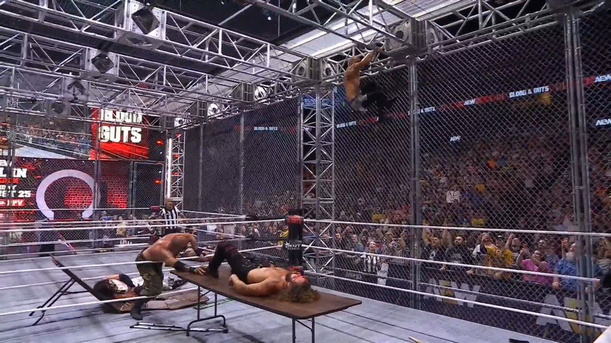 Darby Allin with a coffin drop from the top of the cage. #AEWBloodAndGuts