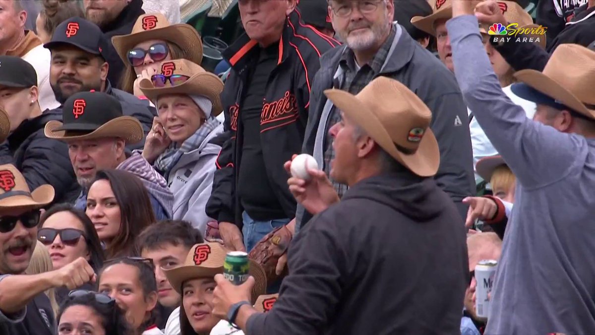 A fan was ejected from the game after tossing a foul ball back onto the field and nearly hitting the umpire 😮