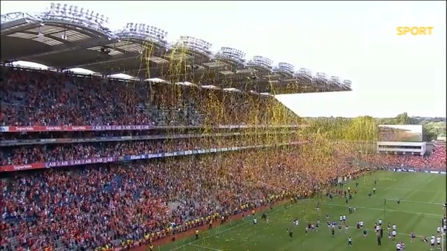 Today belongs to Armagh_GAA 🟠⚪️ GAA president Jarlath Burns hands the Sam Maguire trophy over to Armagh captain Aidan Forker 🏆 #BBCGAA
