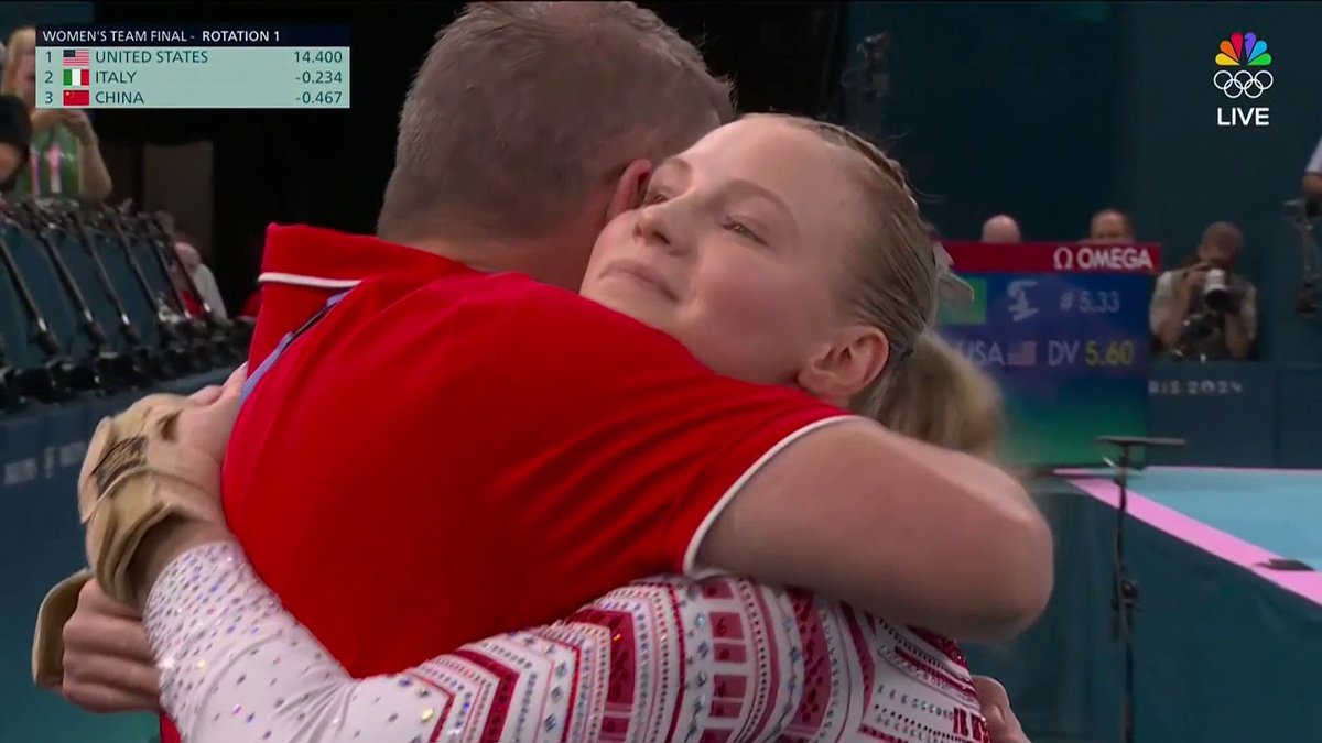 Jade Carey, who has had the flu, contributes to the team gold medal with a wonderful Cheng vault! 14.8.