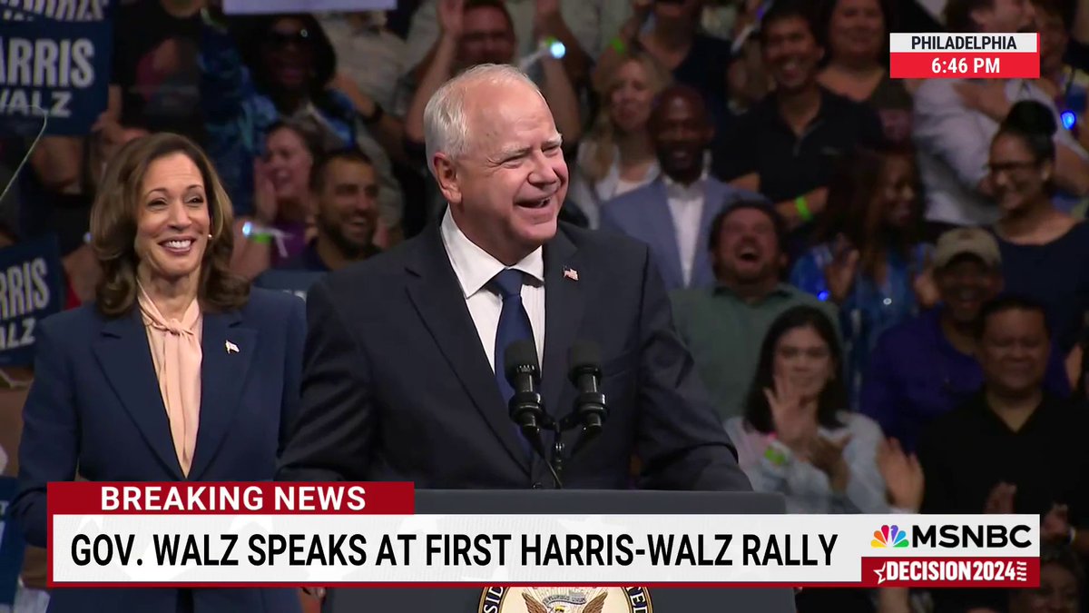 "I can't wait to debate the guy. That is if he's willing to get off the couch and show up," Gov. Tim Walz says about Sen. JD Vance at a Philadelphia rally alongside Vice President Kamala Harris.