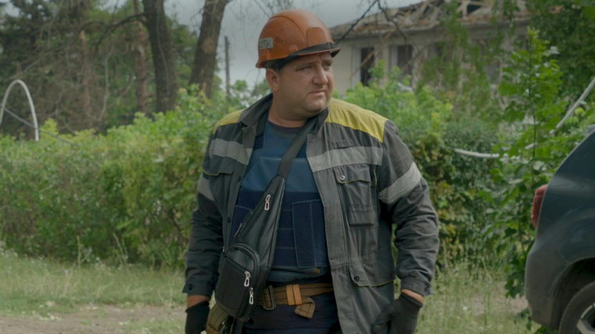 VIDEO: Vitaliy Asinenko keeps a watchful eye on the sky as his team fixes overhead powerlines in Ukraine’s Donetsk region, a constant target for Russian attacks.