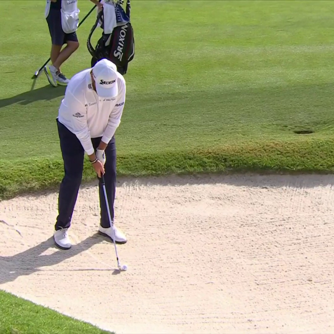 SHANE FROM THE FAIRWAY BUNKER. GOLF SHOT