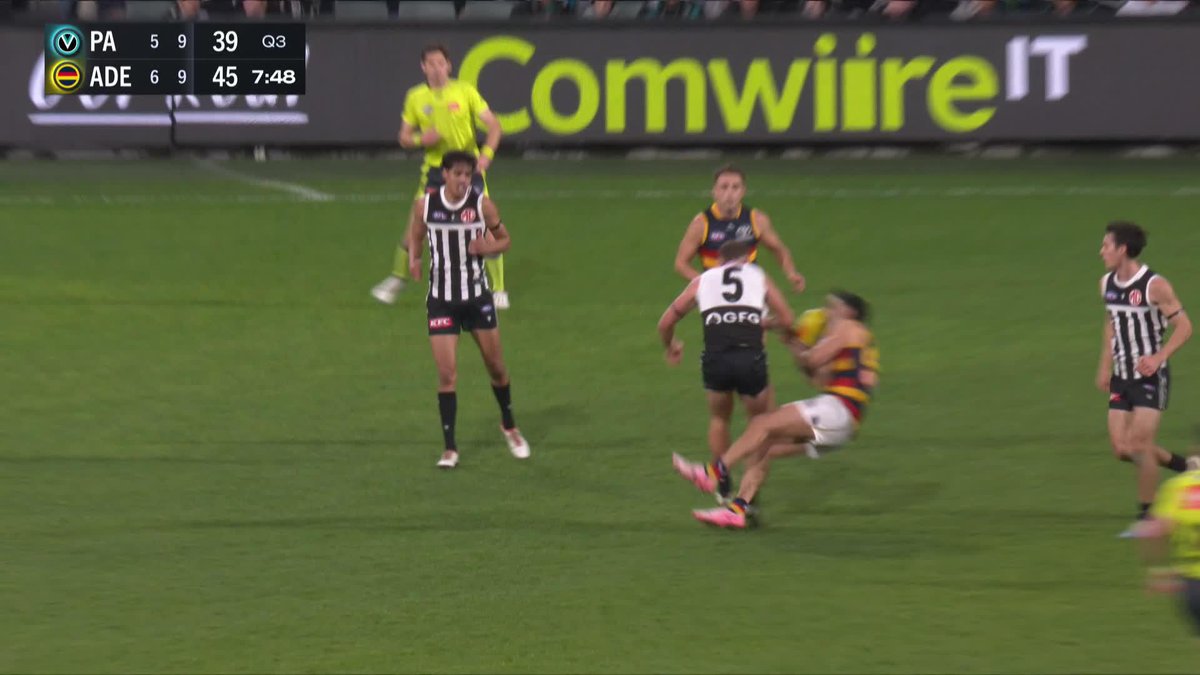 Izak Rankine was helped off the ground following this incident involving Dan Houston. #AFLPowerCrows
