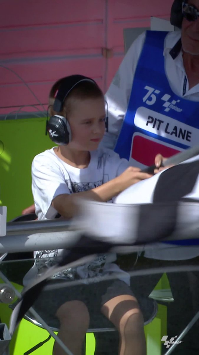 This is Valentino Mayer (named after Valentino Rossi), the young fan who won the challenge to wave the #TissotSprint chequered flag! 🏁 The young boy and his brother Lorenzo (named after Jorge Lorenzo) had a blast around the paddock meeting some #MotoGP stars 🤩 #AustrianGP 🇦🇹