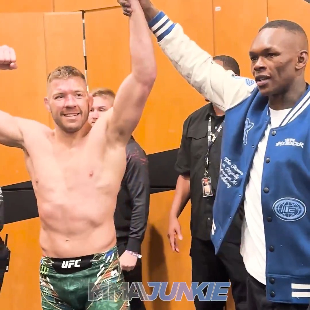 Dricus Du Plessis and Israel Adesanya share an incredible backstage moment after #UFC305 and embrace each other families. ❤️