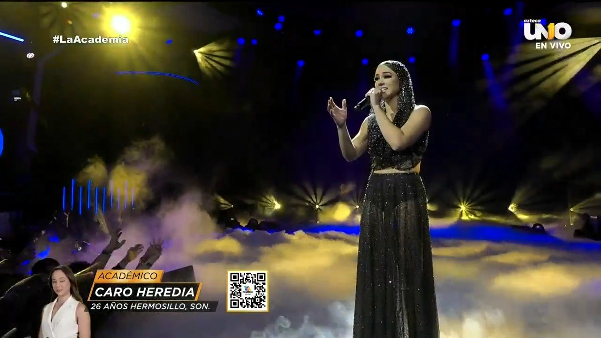 ¡Qué bonita canción le tocó a #CaroHeredia! Nos tocó el cora con "¿𝗖𝗢́𝗠𝗢 𝗣𝗔𝗚𝗔𝗥𝗧𝗘?" de #CarlosRivera. 🧡🥹🙌🏼 ¿Qué te pareció su interpretación? #LaAcademia. #TeCambiaLaVida 🔴 EN VIVO ahora: