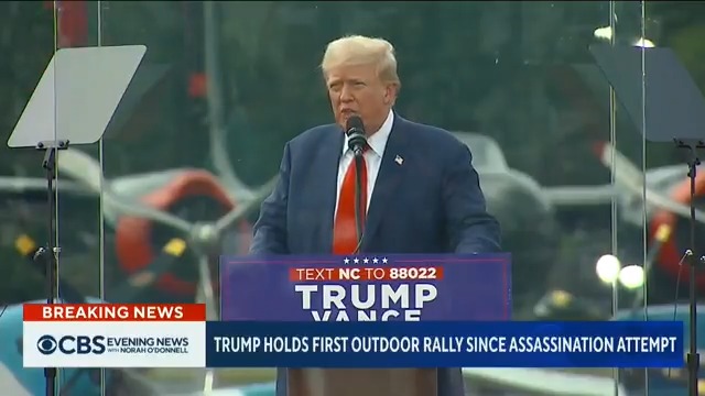 Donald Trump was surrounded by bulletproof glass and additional security in North Carolina for his first outdoor campaign rally since an assassination attempt on his life last month. The former president responded to comments made by the Obamas at the DNC in Chicago.
