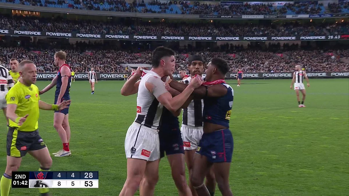 Darcy Moore received a free kick after this incident with Kysaiah Pickett. #AFLDeesPies