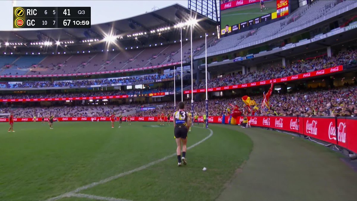 How has Bauer scored from there... with a drop punt? 🤯 #AFLTigersSuns