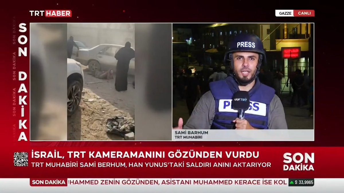 Han Yunus'ta TRT ekibine saldırı... Katil İsrail'in Gazze Şeridi'nin güneyindeki Han Yunus'ta düzenlediği saldırıda TRT kameramanı ve asistanı yaralandı. TRT muhabiri Sami Berhum, saldırı anını aktardı.