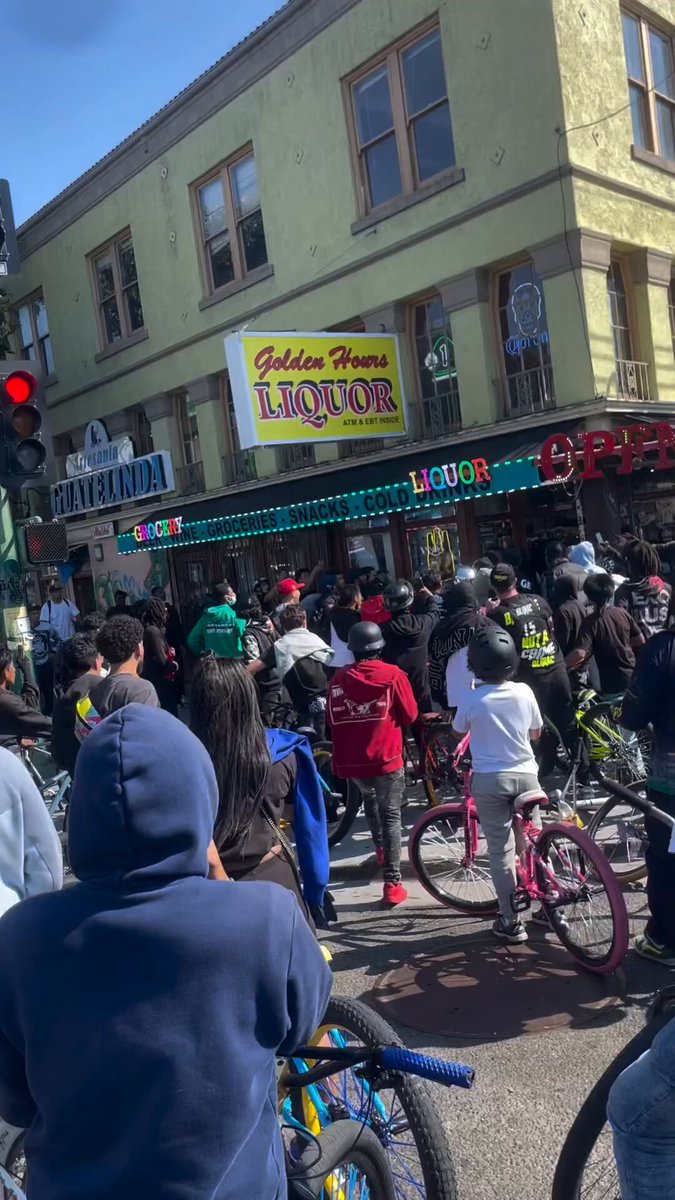 Store owner pulls gun on mob of kids trying to jump him after they stole from his shop in Oakland, California 😳