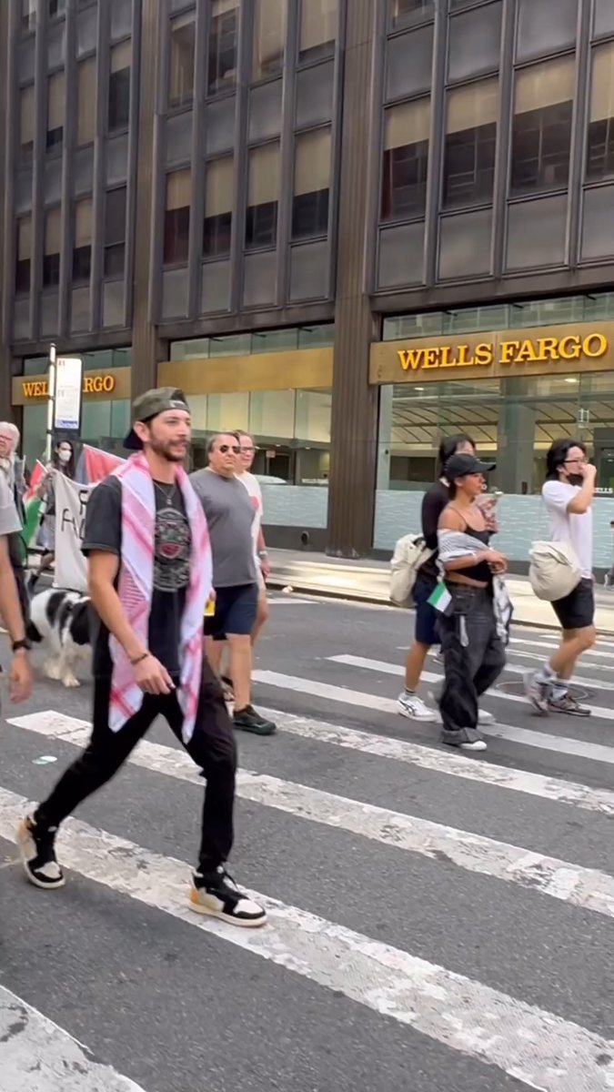I am shaking. We were walking home from lunch with our family in our completely distraught state and we were blocked from crossing the street by these soulless terror supporters chanting for MORE violence. Yeah, we’re LIVID by this complete lack of humanity—ESPECIALLY TODAY—and we couldn’t hide it. Our kids are devastated to see this happening in their own backyard. It’s HORRIFIC. What has become of this city???? I don’t blame the NYPD. They’re doing their best within the framework they’re permitted by law. This is truly an alternate universe. Do we even have a future here?
