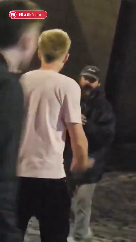 Shia LaBeouf seen shouting 'let's go' and preparing to confront men outside an Edinburgh pub